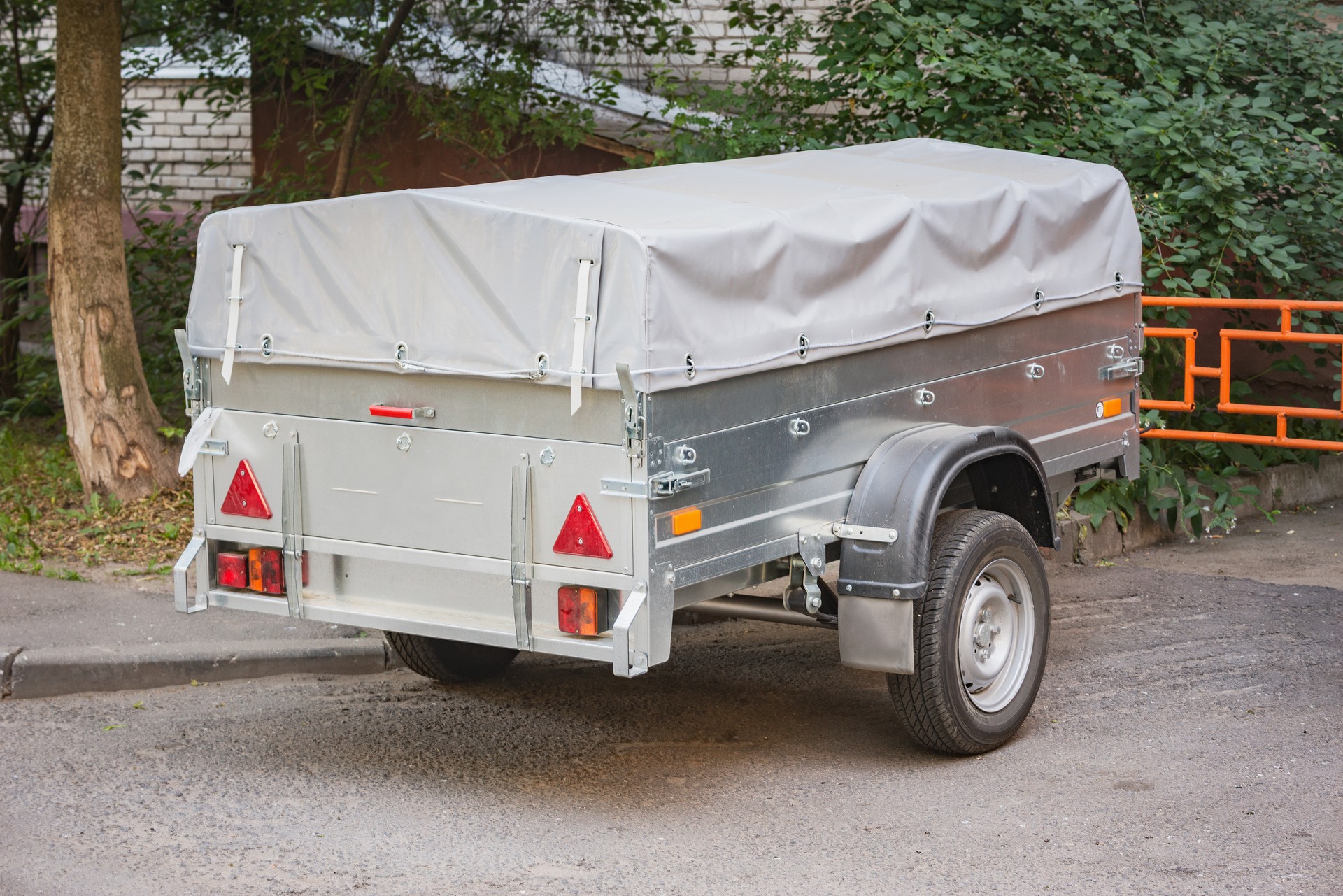 Trailer stands on the street.